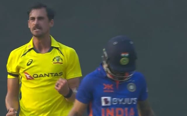 Mitchell Starc and Virat Kohli