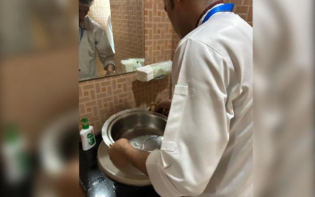 Catering staff uses toilet tap water to wash utensils