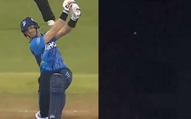 Guptill's humongous maximum shatters glass of commentary box