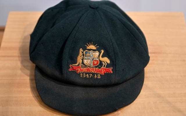 Donald Bradman's Baggy Green auctioned for $250,000