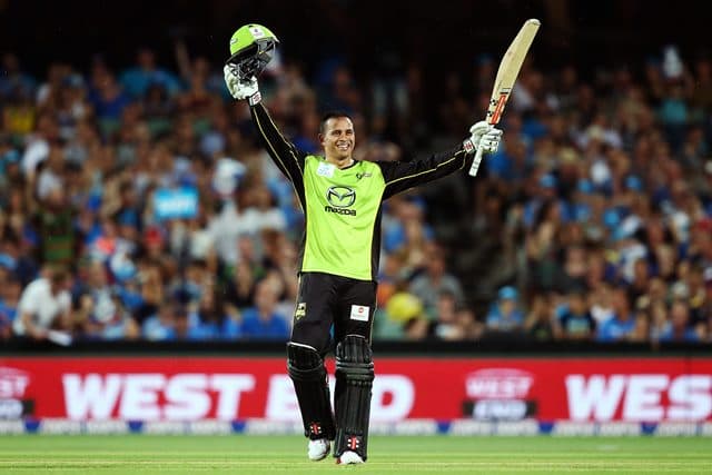 ADELAIDE, AUSTRALIA - JANUARY 21: Usman Khawaja of the Sydney Thunder celebrates reaching 100 runs during the Big Bash League Semi Final match between the Adelaide Strikers and the Sydney Thunder at Adelaide Oval on January 21, 2016 in Adelaide, Australia. (Photo by Morne DeKlerk - CA/Cricket Australia/Getty Images)