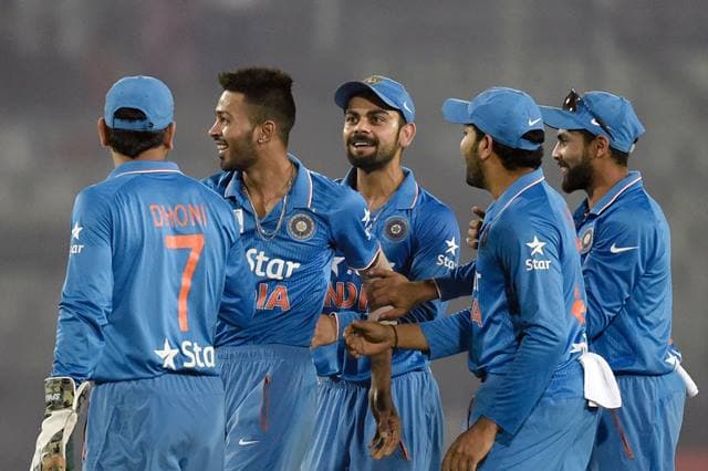 India's Hardik Pandya (2nd L) is congratulated by teammates after the dismissal of Sri Lanka's Tillakaratne Dilshan during the Asia Cup T20 cricket tournament match between India and Sri Lanka at the Sher-e-Bangla National Cricket Stadium in Dhaka on March 1 , 2016. / AFP / MUNIR UZ ZAMAN (Photo credit should read MUNIR UZ ZAMAN/AFP/Getty Images)