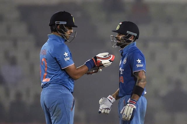 India's Virat Kohli (R) celebrates with India's Yuvraj Singh (L) after hitting a boundary  during the Asia Cup T20 cricket tournament match between India and Sri Lanka at the Sher-e-Bangla National Cricket Stadium in Dhaka on March 1 , 2016. / AFP / MUNIR UZ ZAMAN        (Photo credit should read MUNIR UZ ZAMAN/AFP/Getty Images)