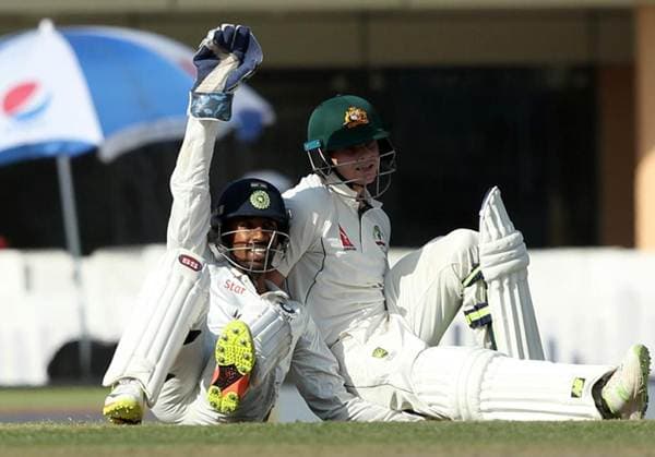 Wriddhiman Saha and Steve Smith