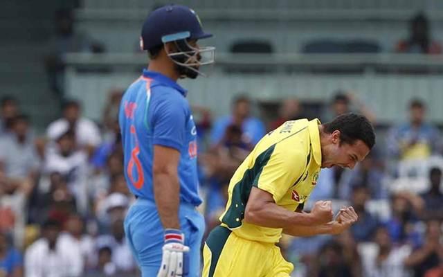 Nathan Coulter-Nile of Australia celebrates the wicket of Virat Kohli