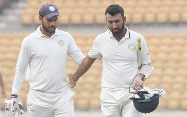 Sheldon Jackson and Cheteshwar Pujara